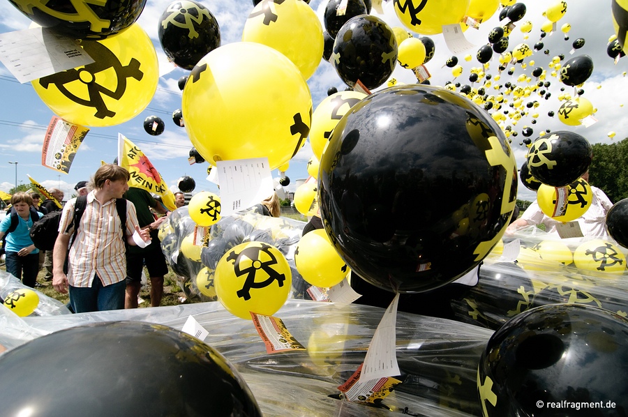 Balloon action in front of the atomic power plant Biblis, February 2010: Activists visualize a radioactive cloud