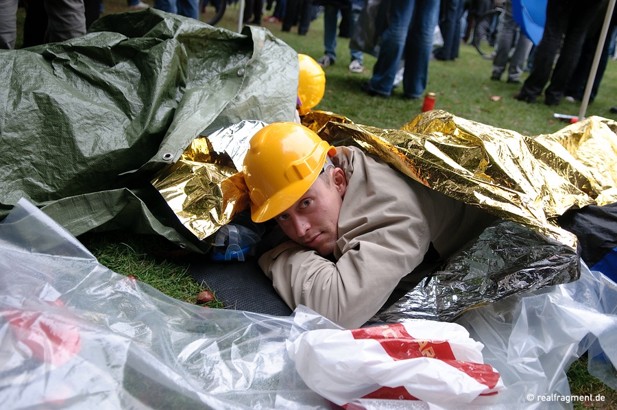 Activists have locked themselves into the ground